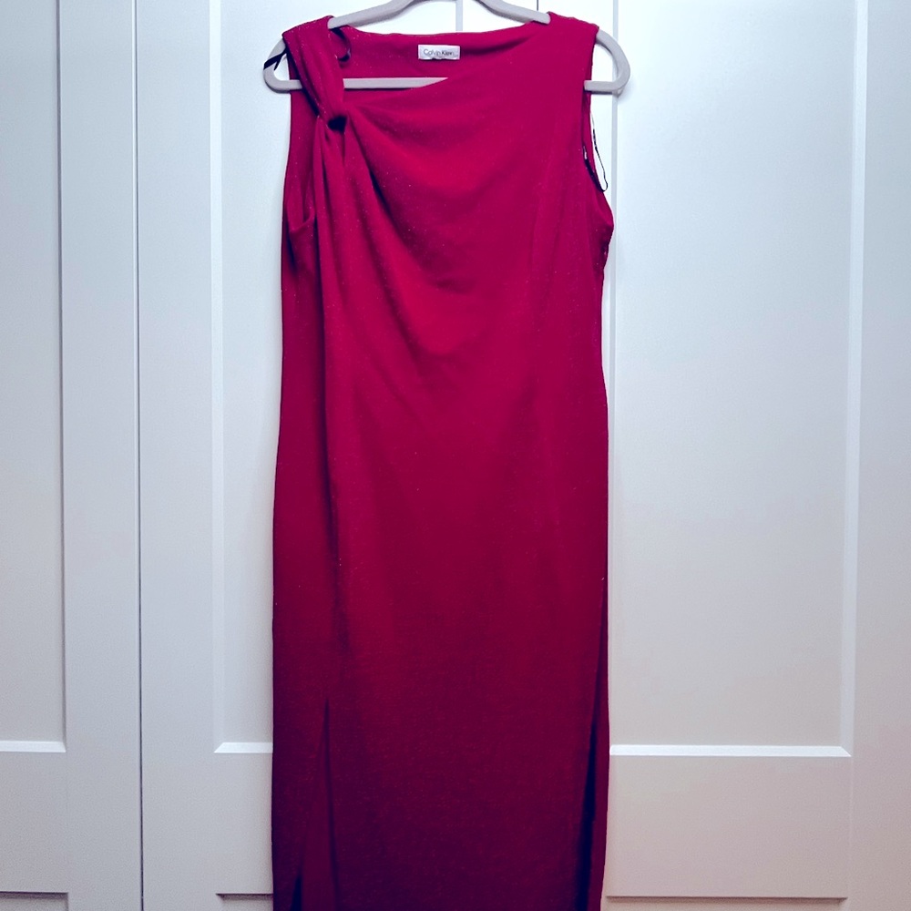 Formal red dress with silver threading. Ankle length, shoulder detail